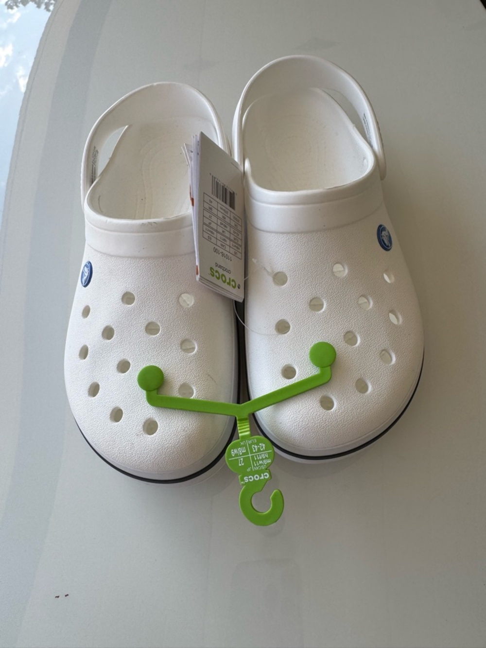 Brand new CROCS women size 11 men size 9